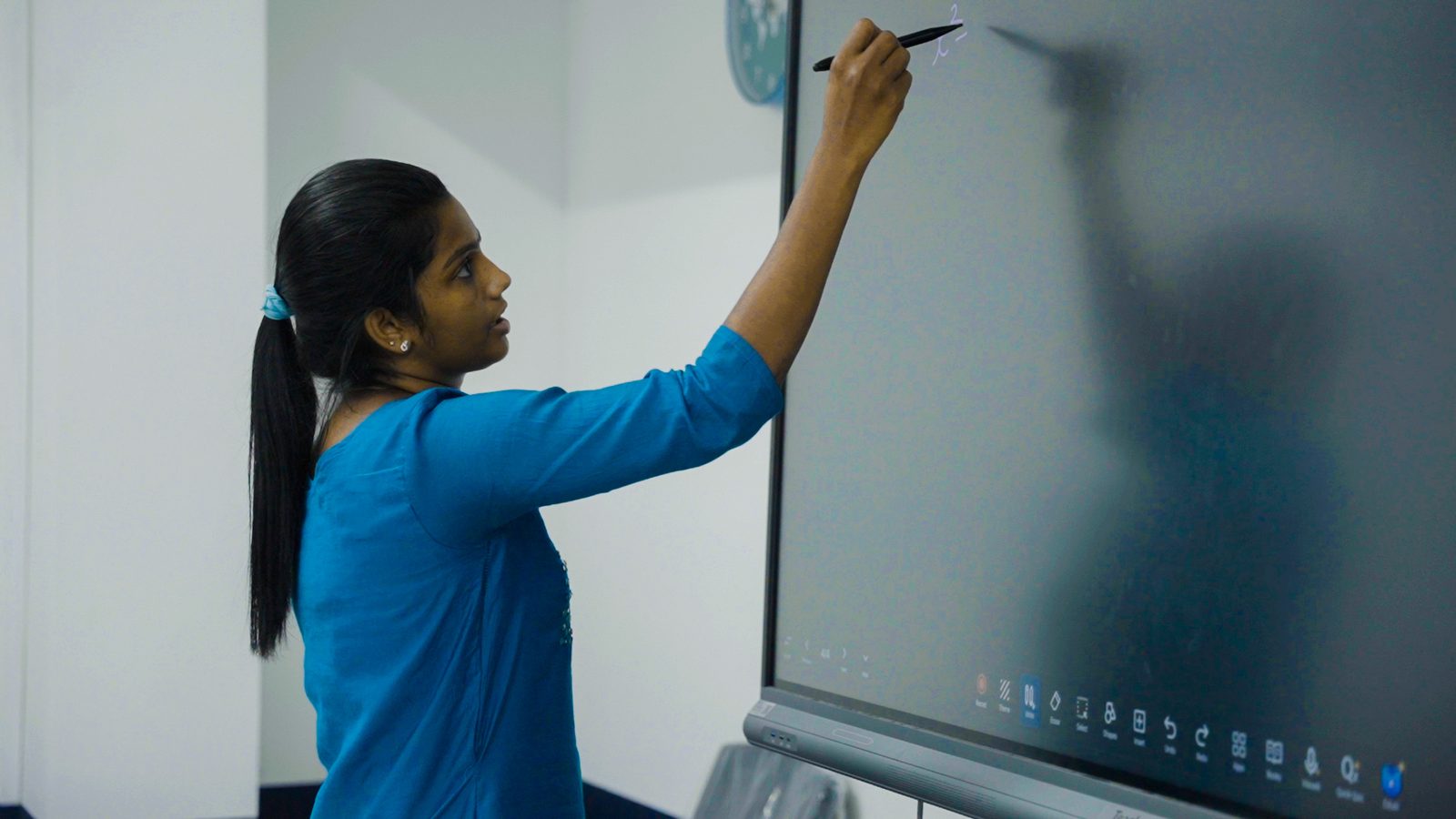 A NavPath faculty member teaching at the board during a crash course class