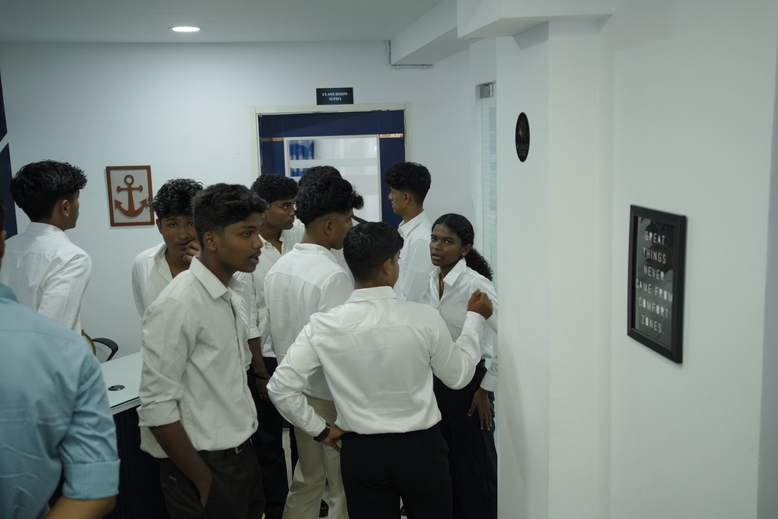 Students in the classroom hallway at NavPath Academy