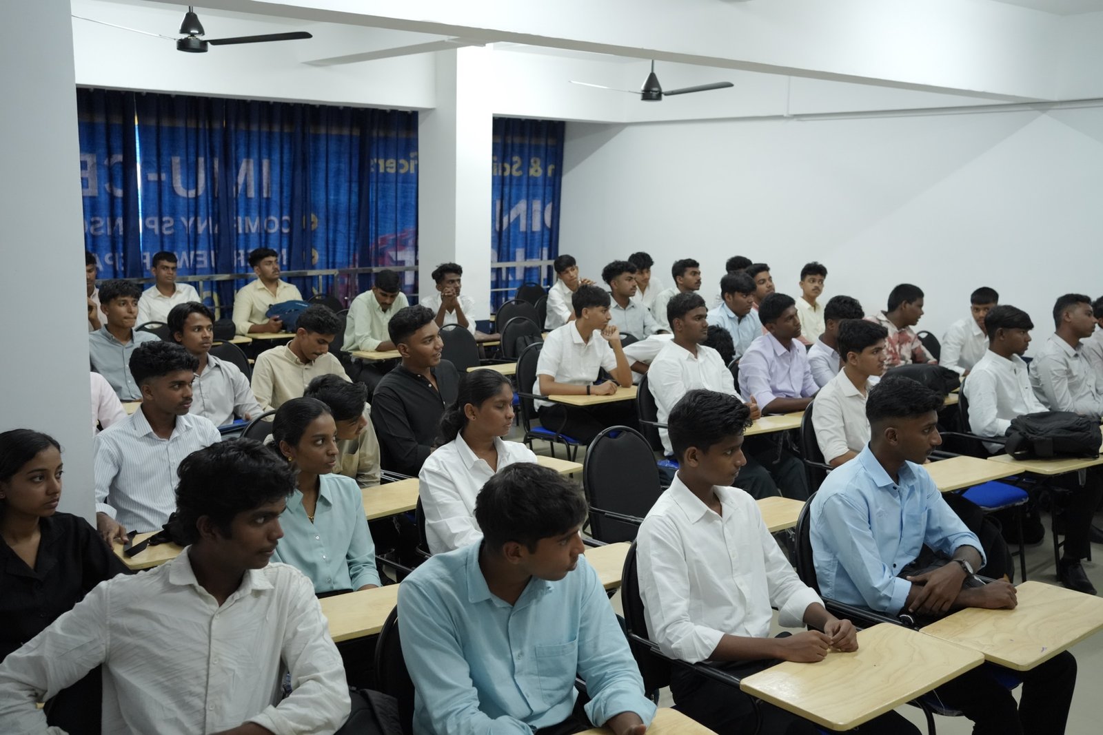 Students at their desks in a NavPath Academy classroom