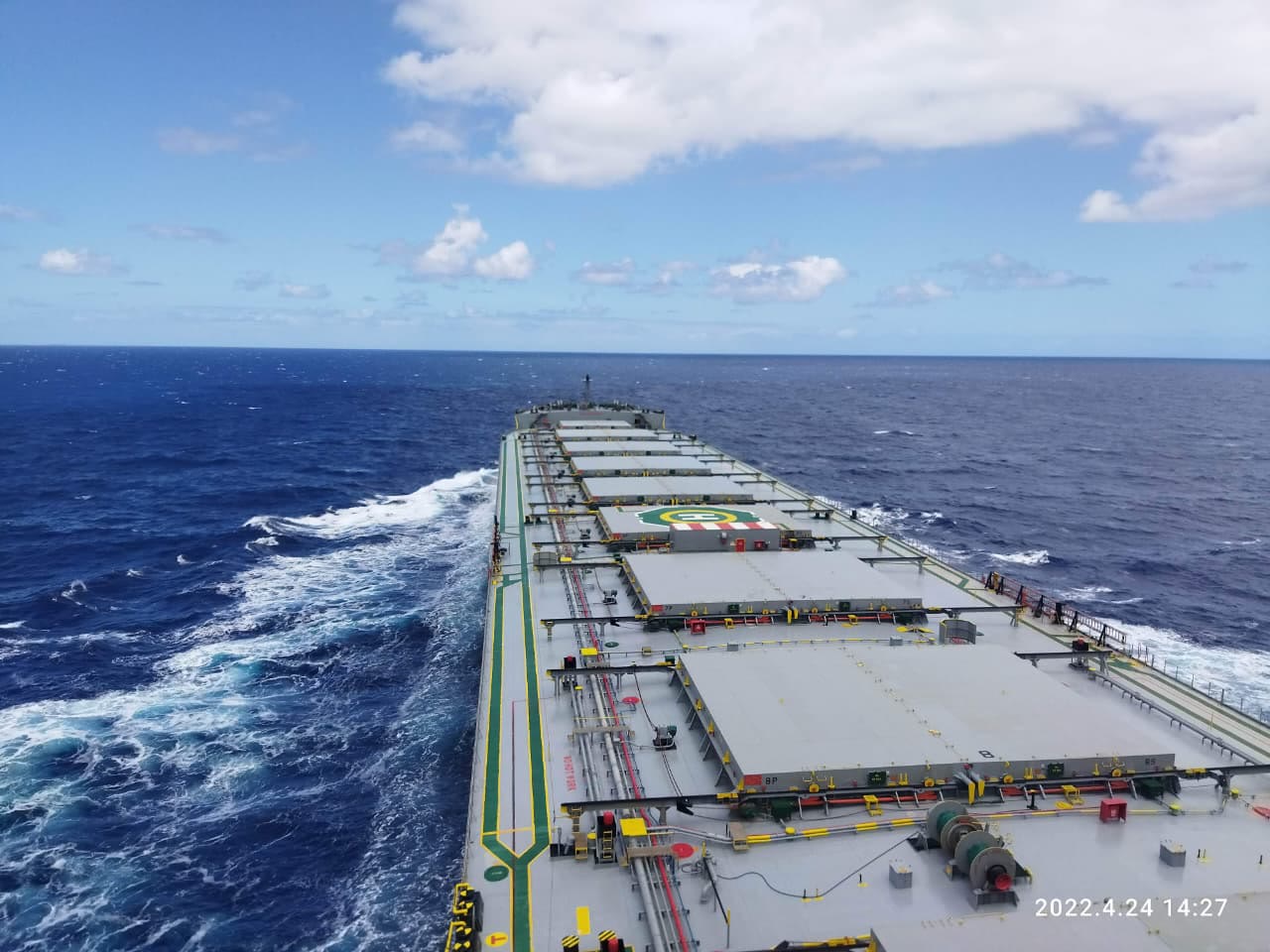 A bulk carrier under way at sea
