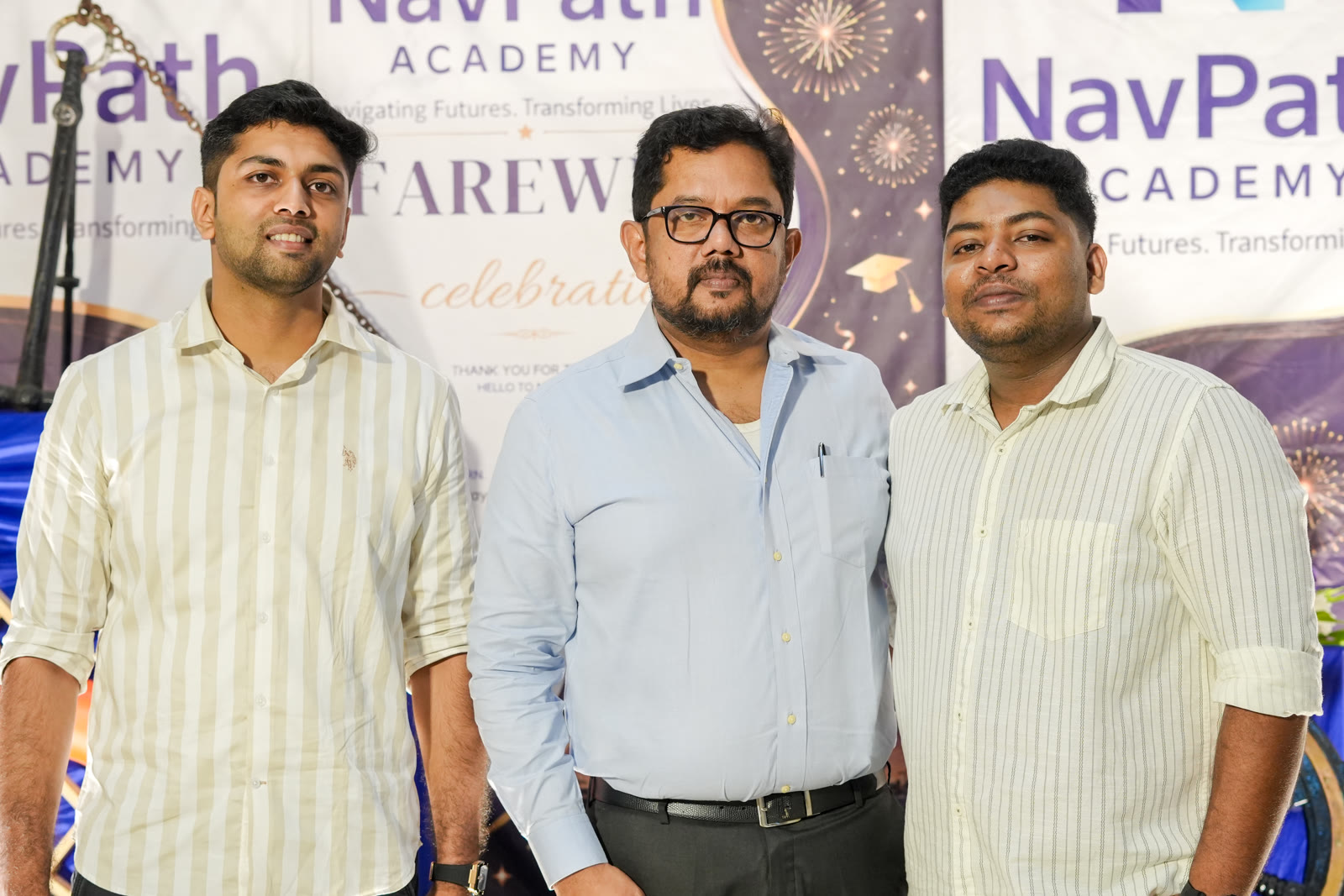 Mentors with the farewell banner at NavPath Academy